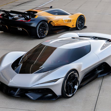 General Motors revealed the Chevrolet Corvette CX concept car, front, and the CX.R Vision Gran Turismo concept car, back, Aug. 15 at The Quail motorsports event in Carmel, California.