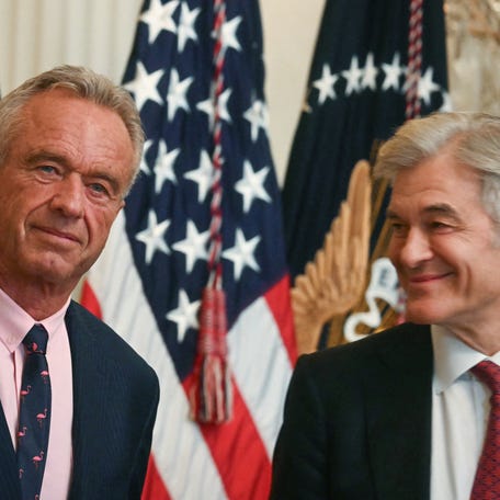 Health and Human Services Secretary Robert F. Kennedy Jr., left, and Medicare and Medicaid Administrator Mehmet Oz at the White House in Washington, DC, on July 30, 2025.