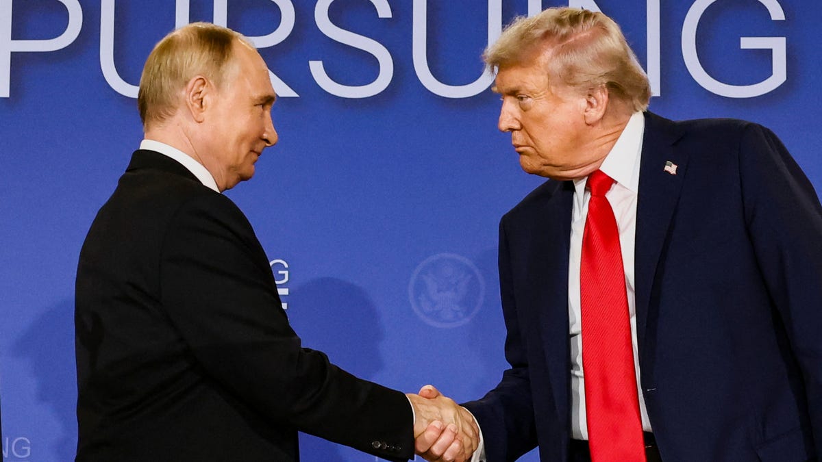 U.S. President Donald Trump and Russian President Vladimir Putin shake hands during a press conference following their meeting to negotiate an end to the war in Ukraine, at Joint Base Elmendorf-Richardson, in Anchorage, Alaska, U.S., August 15, 2025.
