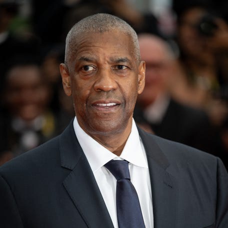 Denzel Washington attends the "Highest 2 Lowest" red carpet during the 78th Cannes Film Festival in Cannes France on May 19, 2025.