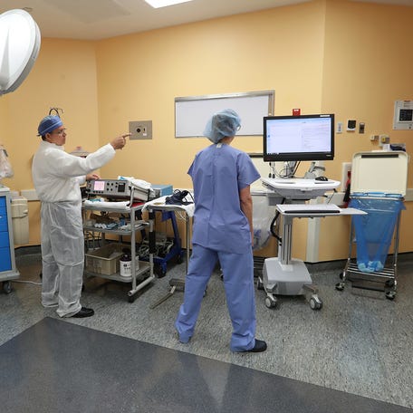 File photo: Dr. Ivan Mazzorana and his team prepares the room for Carolyn Biss' therapy. Lehigh Regional Medical Center has launched Electroconvulsive therapy as part of its mental health treatment program, making the 88-bed health center the only Lee County medical facility to offer such care.