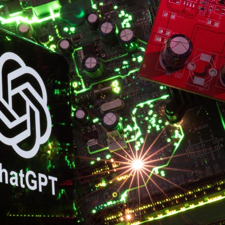 FILE PHOTO: A smartphone with a displayed ChatGPT logo is placed on a computer motherboard in this illustration taken February 23, 2023. REUTERS/Dado Ruvic/Illustration/File Photo