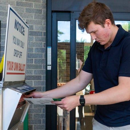 Nathaniel Woosley, from Doylestown, drops off his mail-in ballot on Primary Day at the Bucks County Courthouse in Doylestown on May 20, 2025.