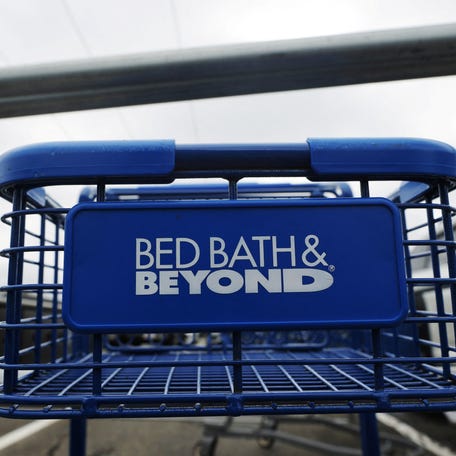 A shopping cart stands in the parking lot of a Bed Bath & Beyond store, after the company declared bankruptcy, in Danvers, Massachusetts, U.S., April 24, 2023.