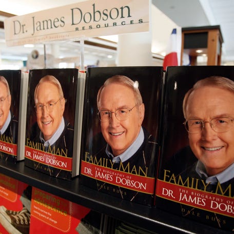 Copies of "Family Man", the biography of Dr. James Dobson, founder of Focus on the Family, are seen in the bookstore at the Focus headquarters in Colorado Springs, Colorado July 20, 2007. Picture taken July 20, 2007. REUTERS/Rick Wilking (UNITED STATES)
