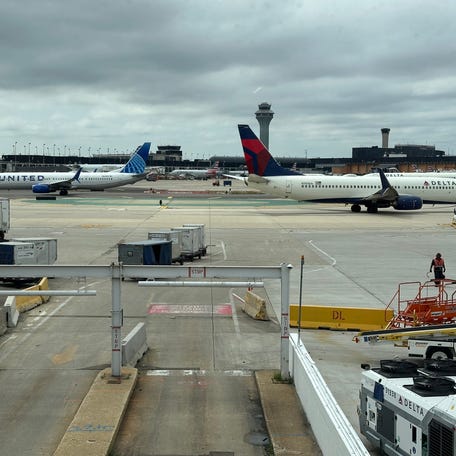 Delta Air Lines and United Airlines planes at Chicago O'Hare International Airport.
