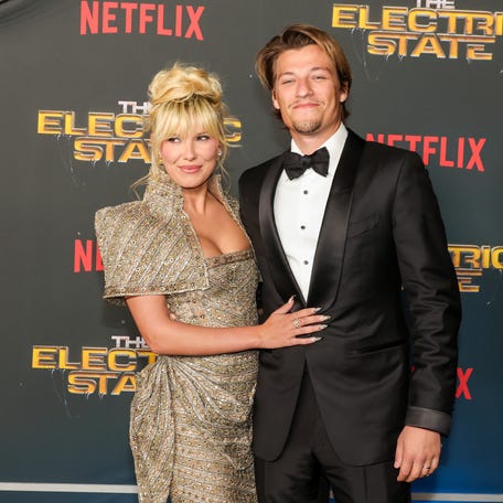 Millie Bobby Brown and Jake Bongiovi attend the premiere of "The Electric State" on Feb. 24, 2025, in Los Angeles.