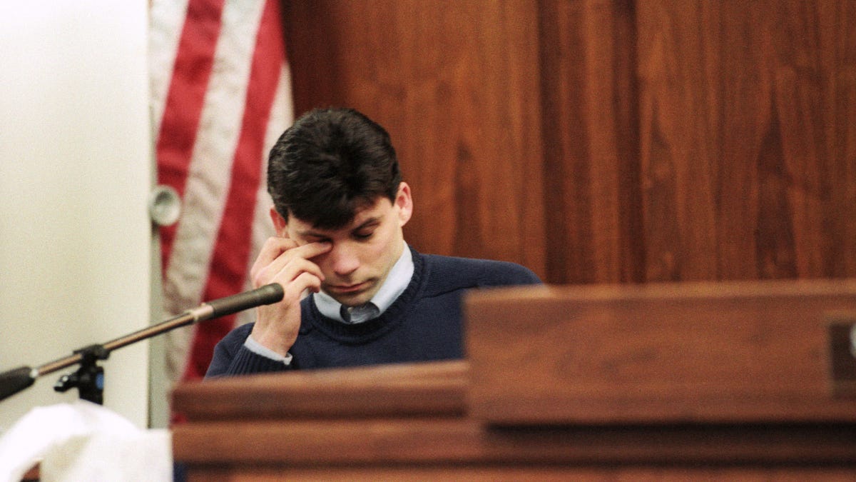 Lyle Menendez wipes his eyes on Sept. 10, 1993, as he testifies in a Van Nuys, California, courtroom in his defense in the shooting of his parents Lyle and Kitty Menendez. Lyle and brother Erik have admitted to shooting their parents in reaction to years of alleged abuse.
