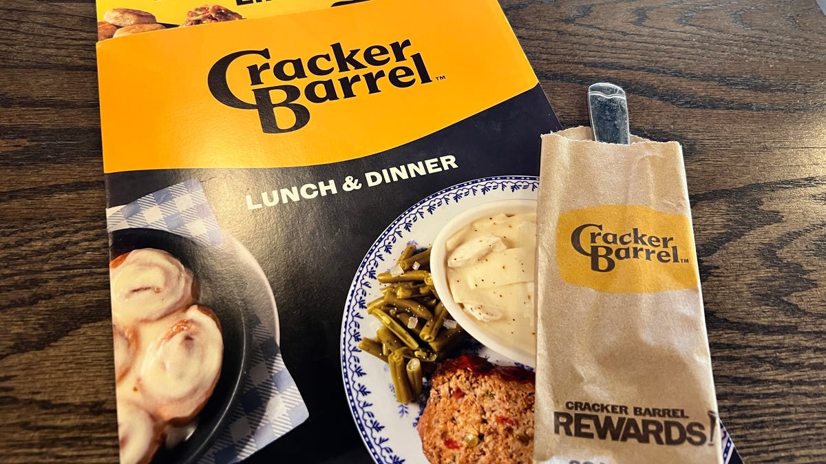 The new Cracker Barrel logo already appears on menus and paper wraps for cutlery on Aug. 22, 2025, in Fishers, Indiana.