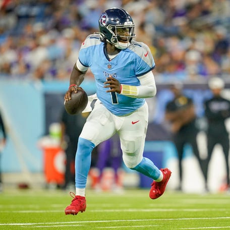 Tennessee Titans quarterback Cam Ward (1) runs the ball during the second quarter of an NFL pre-season game against the Minnesota Vikings at Nissan Stadium in Nashville, Tenn., Friday, Aug. 22, 2025.
