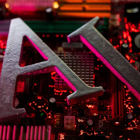 AI (Artificial Intelligence) letters are placed on computer motherboard in this illustration created on June 23, 2023. REUTERS/Dado Ruvic/Illustration/File Photo