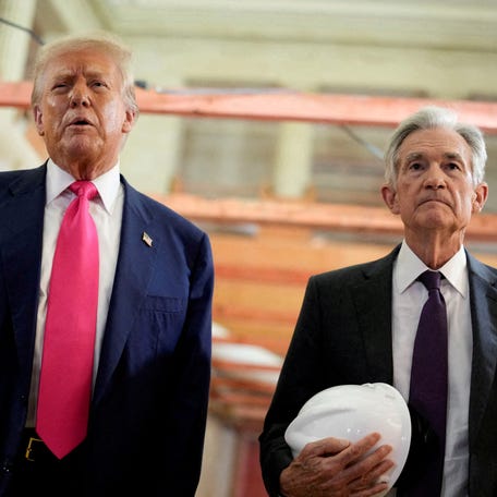 U.S. President Donald Trump and Federal Reserve Chair Jerome Powell speak during a tour of the Federal Reserve Board building, which is currently undergoing renovations, in Washington, D.C. on July 24, 2025.