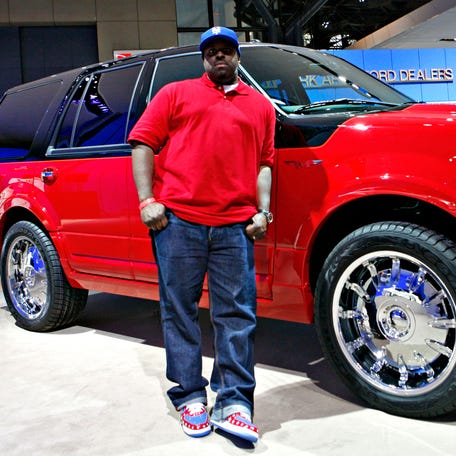 DJ Funkmaster Flex poses in front of the Ford Expedition Funkmaster Flex Edition at the New York International Auto Show in New York, Wednesday, April 4, 2007.