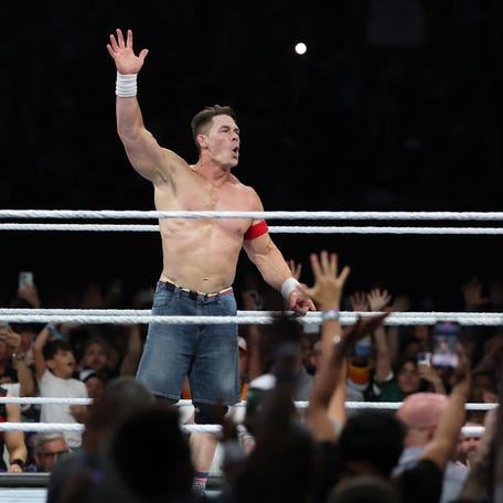 John Cena celebrates during the street fight match against Cody Rhodes during the WWE 2025 SummerSlam at MetLife Stadium on August 3, 2025 in East Rutherford, New Jersey.