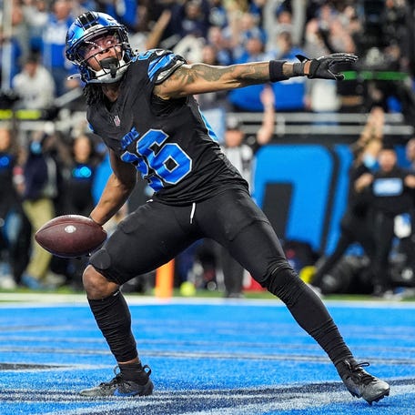 Lions running back Jahmyr Gibbs celebrates a touchdown against the Vikings during the second half at Ford Field in Detroit on Jan. 5, 2025.