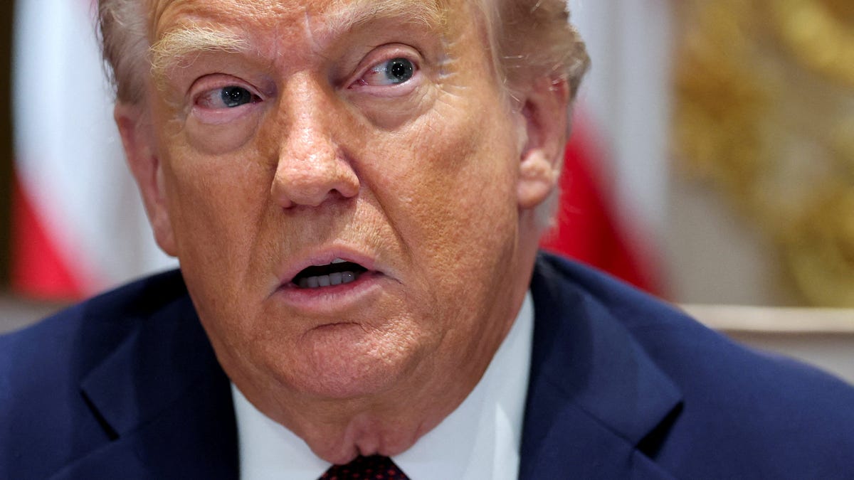 FILE PHOTO: U.S. President Donald Trump attends a cabinet meeting at the White House in Washington, D.C., U.S., August 26, 2025. REUTERS/Jonathan Ernst/File Photo