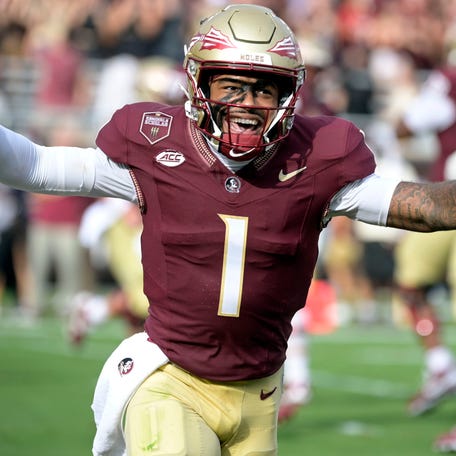 Florida State quarterback Tommy Castellanos (1) celebrates after a touchdown against the Alabama during the second half at Doak S. Campbell Stadium.