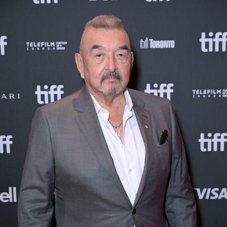 Actor Graham Greene, pictured at the 2023 Toronto Film Festival, has died.