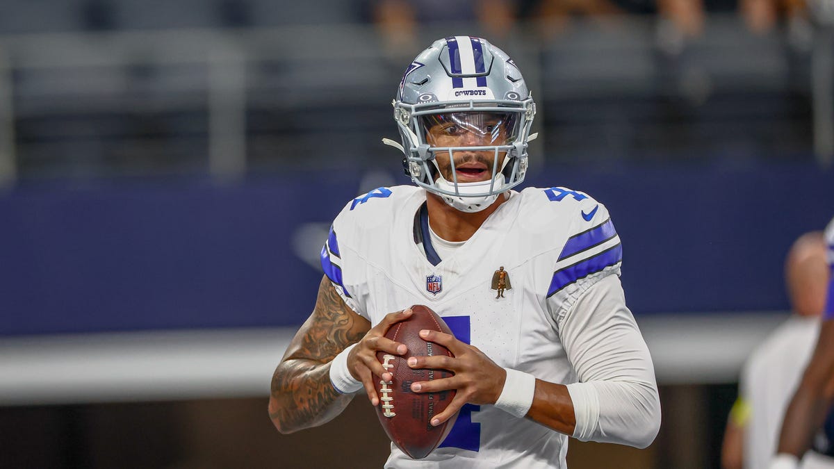 Aug 16, 2025; Arlington, Texas, USA; Dallas Cowboys quarterback Dak Prescott (4) warms up before the game against the Baltimore Ravens at AT&T Stadium. Mandatory Credit: Kevin Jairaj-Imagn Images