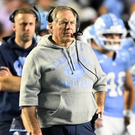 North Carolina football coach Bill Belichick stands on the sidelines during his team's game against TCU at Kenan Stadium in North Carolina.