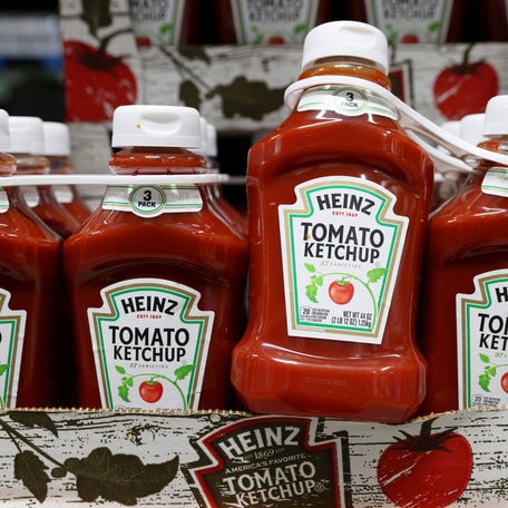 Bottles of Heinz Tomato Ketchup, owned by the Kraft Heinz Company, are seen for sale in Queens, New York on Nov. 16, 2021.