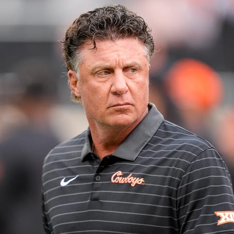 Oklahoma State coach Mike Gundy walks on the field before an NCAA football game between Oklahoma State and UT Martin in Stillwater, Okla., on Thursday, Aug. 28, 2025.