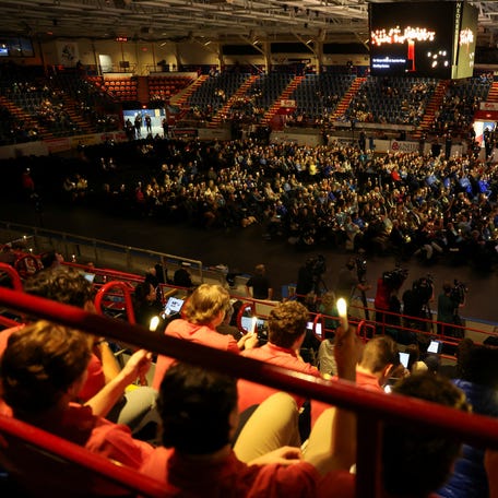 Attendees watch the Oct. 25 commemoration event at the Colisee arena on the one-year anniversary of the mass shooting in Lewiston, Maine, U.S. Oct. 25, 2024.