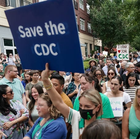 Employees and supporters of the Centers for Disease Control and Prevention rally outside its global headquarters on Aug. 28, 2025, in Atlanta.
