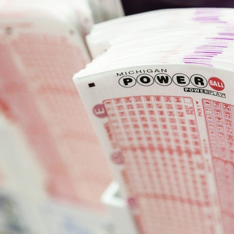 Slips for the Michigan Powerball sit on the counter at Jazz Liquor Store on Woodward in downtown Detroit on Wednesday, Jan. 6, 2016.