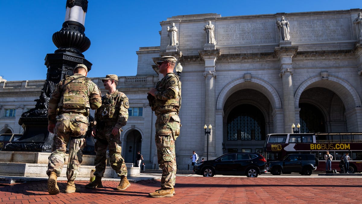Members of the Louisiana National Guard patrol the perimeter of Union Station in Washington, DC, as President Donald Trump's deployment of National Guard troops and federal takeover of Metro Police Department continues on Aug. 26, 2025.