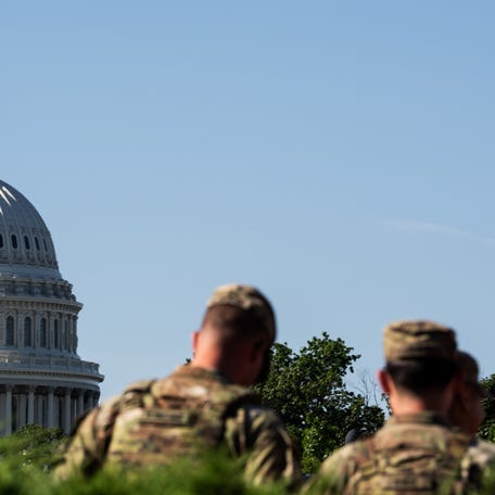 Members of the Louisiana National Guard patrol the perimeter of Union Station in Washington D.C. as President Donald Trump's deployment of National Guard troops and federal takeover of Metro Police Department continues Tuesday, Aug. 26, 2025. National Guard troops began carrying M17 pistols and M4 rifles over the weekend for self-defense.