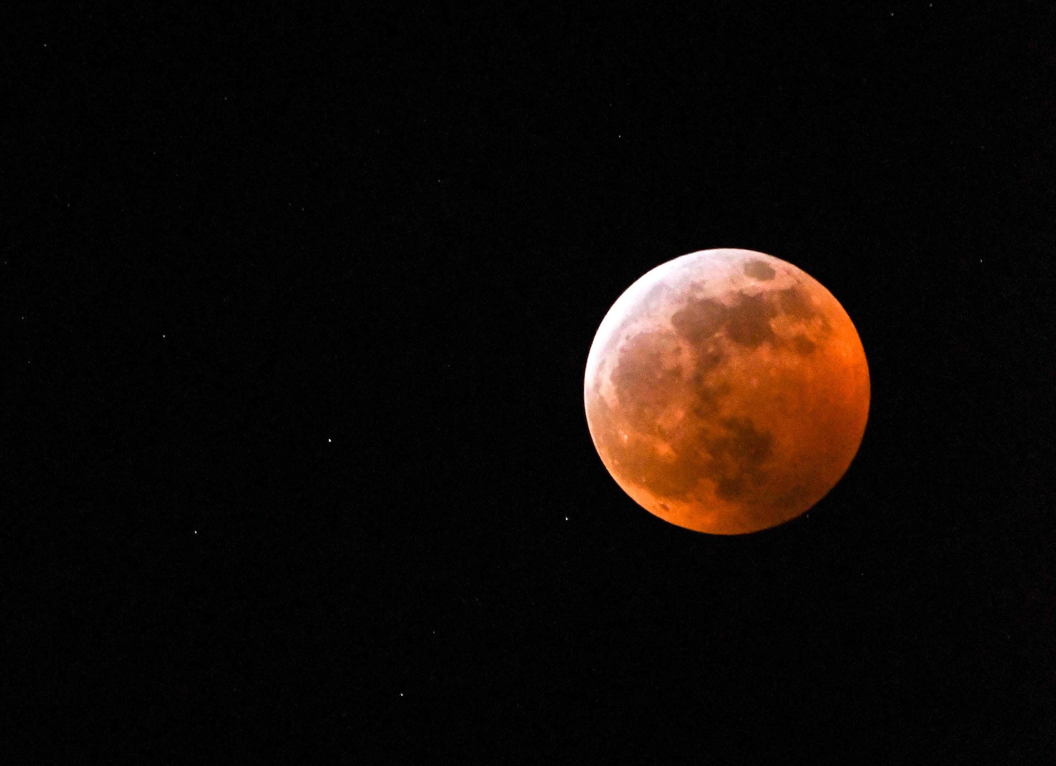 A lunar eclipse happens Sunday. What time is it and who can see it?