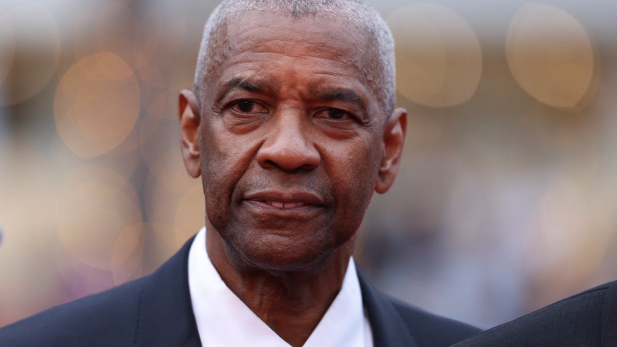 Denzel Washington arrives for the screening of the film "Highest 2 Lowest" at the 78th edition of the Cannes Film Festival in southern France on May 19, 2025.