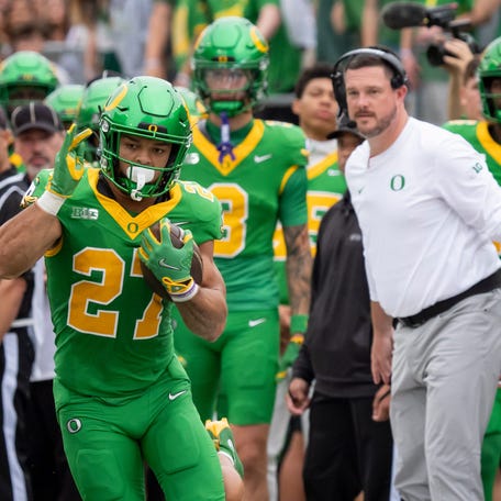 Oregon running back Jayden Limar carries the ball as the Oregon Ducks host the Oklahoma State Cowboys on Sept. 6, 2025, at Autzen Stadium in Eugene, Oregon.