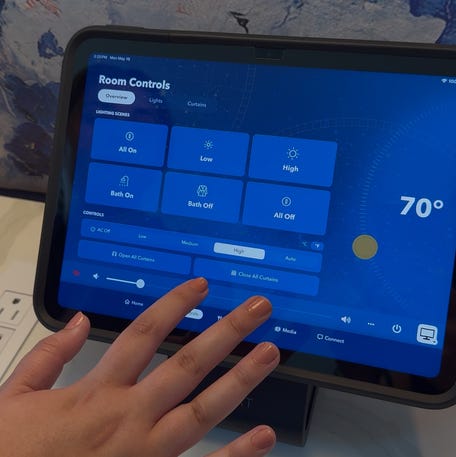 A bedside tablet allows guests to control their room temperature and lighting at Universal Helios Grand Hotel in Orlando, Florida.