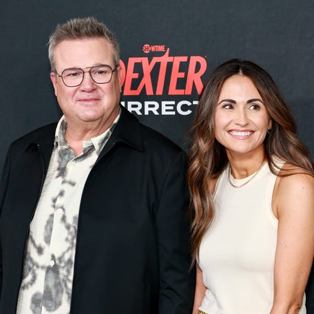Eric Stonestreet, left, and Lindsay Schweitzer attend the "Dexter: Resurrection" premiere on July 9, 2025, in New York City.