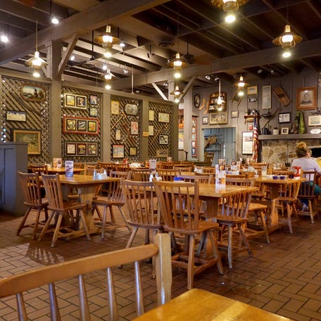 Customers enjoy food at a Cracker Barrel restaurant on August 27, 2025 in Florida City, Florida.
