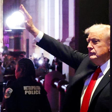 U.S. President Donald Trump waves as he leaves from the Joe's Seafood restaurant near the White House after dinner, in Washington, D.C., U.S., September 9, 2025.