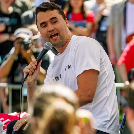Conservative activist and Turning Point USA cofounder Charlie Kirk addresses a Utah Valley University event in Orem on Sept. 10, 2025, when he was fatally shot. Livestream video of the event showed crowds of people running from the university's courtyard where Kirk, 31, was speaking when the shooting occurred.