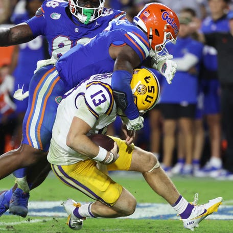 Florida linebacker Shemar James (6) sacks LSU quarterback Garrett Nussmeier (13) during the second half at Ben Hill Griffin Stadium.