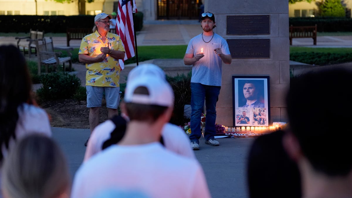 People gather for a vigil in honor of Charlie Kirk following his death on Wednesday, Sep. 10, 2025 at the University of Oklahoma in Norman, Oklahoma. Kirk, founder of Turning Point USA, was killed by a gunshot wound to the neck while speaking at Utah Valley University.