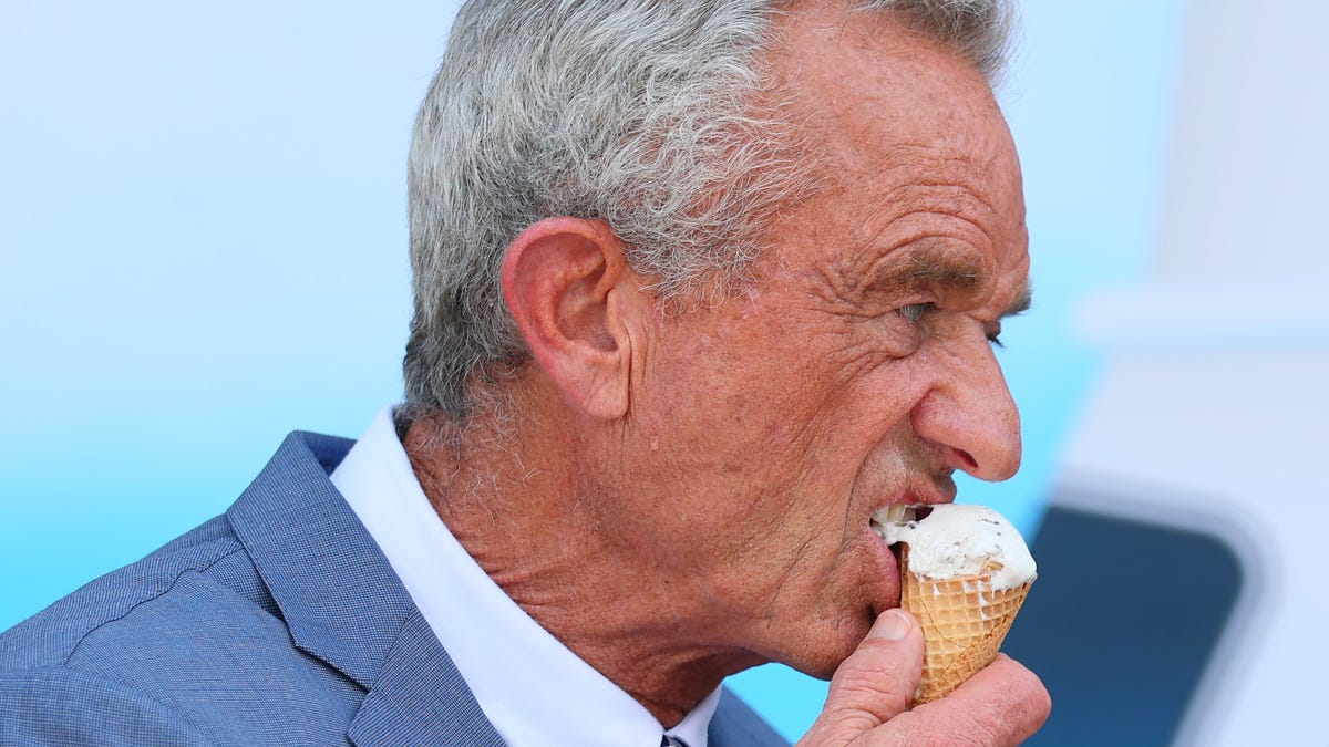 Health and Human Services Secretary Robert F. Kennedy Jr. eats a mint chocolate chip ice cream cone during a press conference on the steps of the United States Department of Agriculture on July 14, 2025 in Washington, DC.