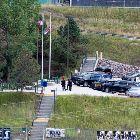 Police officers respond to a shooting at Evergreen High School on Sept. 10 in Evergreen, Colorado.