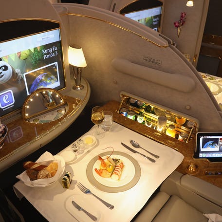 A meal lies served in a compartment in first class on board an Emirates A380 passenger plane at the ILA 2016 Berlin Air Show on June 1, 2016 in Schoenefeld, Germany.