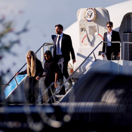 Vice President JD Vance (R) second lady Usha Vance (C) and Erika Kirk deplane Air Force Two while escorting the body of Charlie Kirk on September 11, 2025 in Phoenix, Arizona. Kirk, the CEO and co-founder of Turning Point USA, was shot and killed on Wednesday in Utah.