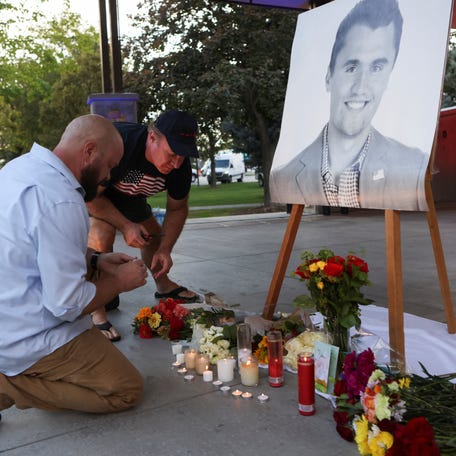 People mourn Charlie Kirk after the conservative activist was fatally shot during an event at Utah Valley University in Orem on Sept. 10, 2025.