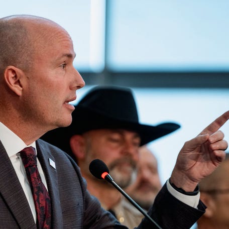Utah Governor Spencer Cox points a finger as he speaks during a press conference announcing details on the suspect in the shooting of U.S. conservative commentator Charlie Kirk, who was fatally shot during an event at Utah Valley University, in Orem, Utah, U.S. September 12, 2025. REUTERS/Cheney Orr