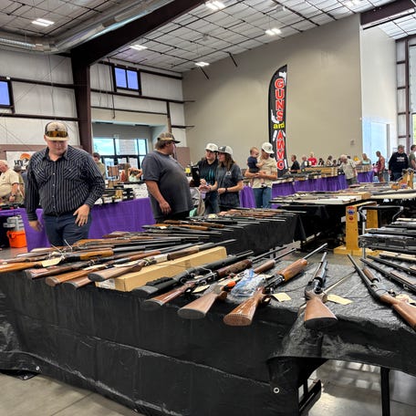 Gun owners and enthusiasts attend the Crossroads of the West Gun Show on Sept. 13, 2025, in Hurricane, Utah.