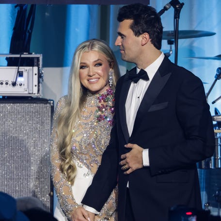 Charlie Kirk and and his wife Erika Lane Frantzve on stage during the Turning Point USA Inaugural-Eve Ball at the Salamander Hotel on January 19, 2025 in Washington, DC.