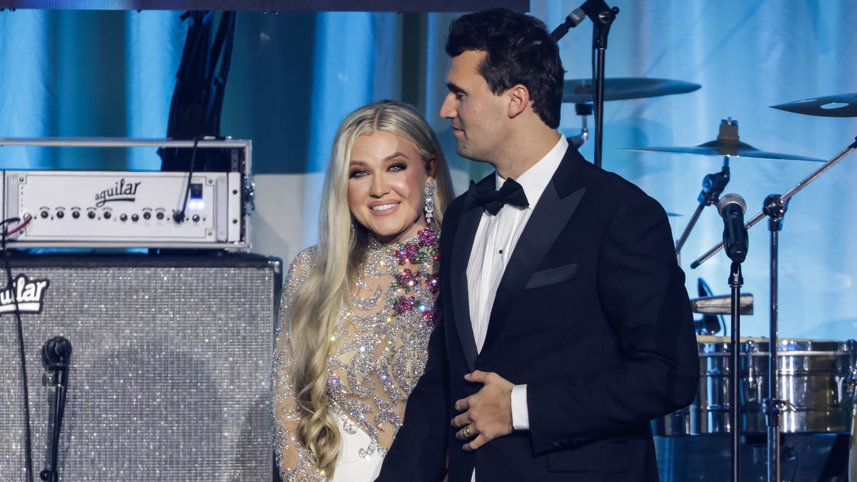 Charlie Kirk and and his wife Erika Lane Frantzve on stage during the Turning Point USA Inaugural-Eve Ball at the Salamander Hotel on January 19, 2025 in Washington, DC.